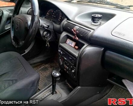 Синий Опель Астра, объемом двигателя 1.6 л и пробегом 200 тыс. км за 1300 $, фото 5 на Automoto.ua