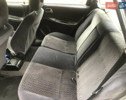 Синий Опель Астра, объемом двигателя 1.4 л и пробегом 250 тыс. км за 800 $, фото 2 на Automoto.ua