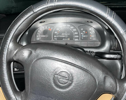 Синий Опель Астра, объемом двигателя 1.4 л и пробегом 356 тыс. км за 1800 $, фото 3 на Automoto.ua