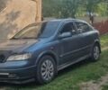 Синий Опель Астра, объемом двигателя 2 л и пробегом 300 тыс. км за 1900 $, фото 1 на Automoto.ua