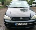 Синий Опель Астра, объемом двигателя 2 л и пробегом 306 тыс. км за 550 $, фото 1 на Automoto.ua