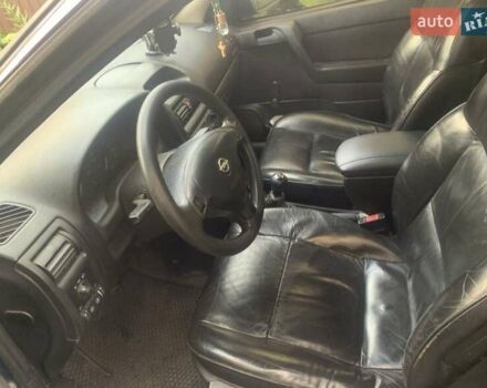 Синий Опель Астра, объемом двигателя 1.6 л и пробегом 270 тыс. км за 1650 $, фото 3 на Automoto.ua