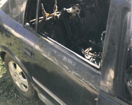 Синий Опель Астра, объемом двигателя 1.6 л и пробегом 400 тыс. км за 550 $, фото 2 на Automoto.ua