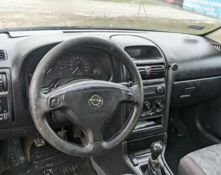 Синий Опель Астра, объемом двигателя 1.6 л и пробегом 200 тыс. км за 750 $, фото 3 на Automoto.ua