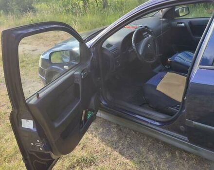 Синий Опель Астра, объемом двигателя 2 л и пробегом 350 тыс. км за 2800 $, фото 4 на Automoto.ua