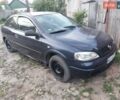 Синий Опель Астра, объемом двигателя 1.7 л и пробегом 400 тыс. км за 2500 $, фото 1 на Automoto.ua