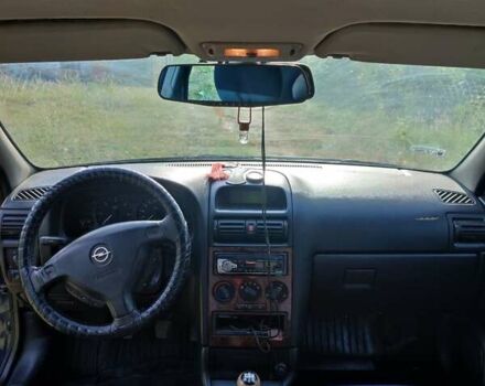 Синий Опель Астра, объемом двигателя 2 л и пробегом 350 тыс. км за 2800 $, фото 6 на Automoto.ua