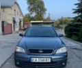 Синий Опель Астра, объемом двигателя 1.4 л и пробегом 246 тыс. км за 2100 $, фото 1 на Automoto.ua