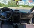 Синий Опель Астра, объемом двигателя 1.2 л и пробегом 300 тыс. км за 1700 $, фото 1 на Automoto.ua