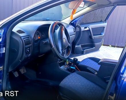 Синий Опель Астра, объемом двигателя 2 л и пробегом 330 тыс. км за 3550 $, фото 7 на Automoto.ua