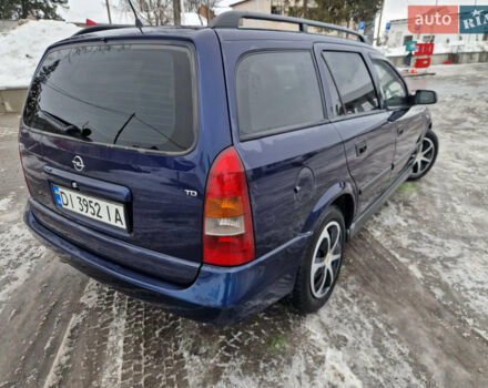 Синий Опель Астра, объемом двигателя 1.7 л и пробегом 305 тыс. км за 3000 $, фото 11 на Automoto.ua