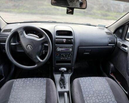 Синий Опель Астра, объемом двигателя 2 л и пробегом 195 тыс. км за 1900 $, фото 9 на Automoto.ua