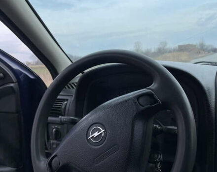 Синий Опель Астра, объемом двигателя 1.2 л и пробегом 457 тыс. км за 2700 $, фото 1 на Automoto.ua