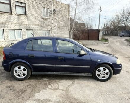 Синий Опель Астра, объемом двигателя 2 л и пробегом 195 тыс. км за 1900 $, фото 3 на Automoto.ua
