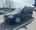 Синий Опель Астра, объемом двигателя 2 л и пробегом 325 тыс. км за 3300 $, фото 1 на Automoto.ua