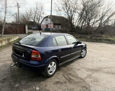 Синий Опель Астра, объемом двигателя 2 л и пробегом 195 тыс. км за 1900 $, фото 4 на Automoto.ua