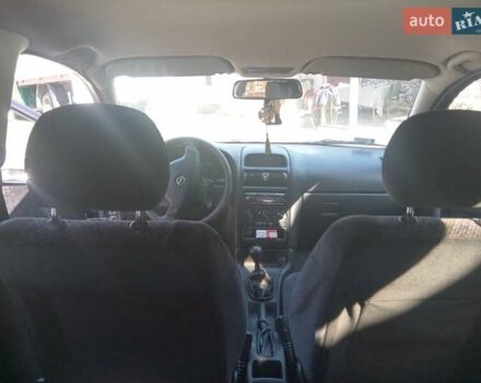 Синий Опель Астра, объемом двигателя 2 л и пробегом 350 тыс. км за 3000 $, фото 11 на Automoto.ua