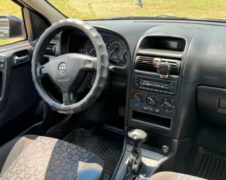 Синій Опель Астра, об'ємом двигуна 2 л та пробігом 335 тис. км за 3004 $, фото 2 на Automoto.ua