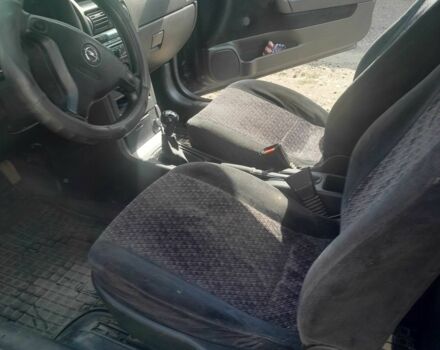 Синий Опель Астра, объемом двигателя 1.4 л и пробегом 295 тыс. км за 3479 $, фото 4 на Automoto.ua