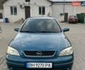 Синий Опель Астра, объемом двигателя 2 л и пробегом 208 тыс. км за 3500 $, фото 1 на Automoto.ua