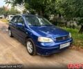 Синий Опель Астра, объемом двигателя 1.2 л и пробегом 218 тыс. км за 3180 $, фото 1 на Automoto.ua