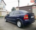 Синий Опель Астра, объемом двигателя 1.2 л и пробегом 209 тыс. км за 3200 $, фото 6 на Automoto.ua