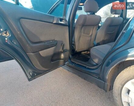 Синий Опель Астра, объемом двигателя 1.82 л и пробегом 380 тыс. км за 3350 $, фото 14 на Automoto.ua