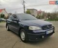 Синий Опель Астра, объемом двигателя 1.2 л и пробегом 209 тыс. км за 3200 $, фото 1 на Automoto.ua