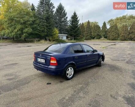 Синий Опель Астра, объемом двигателя 1.39 л и пробегом 320 тыс. км за 2300 $, фото 5 на Automoto.ua