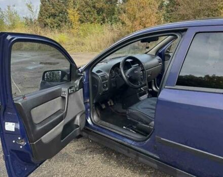 Синий Опель Астра, объемом двигателя 1.39 л и пробегом 320 тыс. км за 2300 $, фото 8 на Automoto.ua