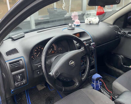 Синий Опель Астра, объемом двигателя 1.6 л и пробегом 239 тыс. км за 3550 $, фото 9 на Automoto.ua