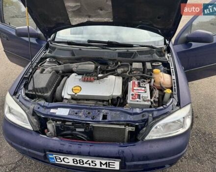 Синий Опель Астра, объемом двигателя 1.39 л и пробегом 320 тыс. км за 2300 $, фото 2 на Automoto.ua