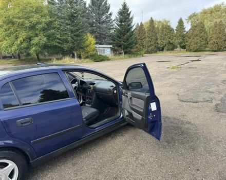 Синий Опель Астра, объемом двигателя 1.4 л и пробегом 320 тыс. км за 2300 $, фото 4 на Automoto.ua