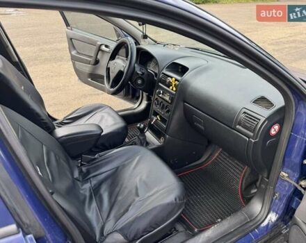 Синий Опель Астра, объемом двигателя 1.39 л и пробегом 320 тыс. км за 2300 $, фото 4 на Automoto.ua