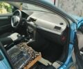 Синий Опель Астра, объемом двигателя 1.7 л и пробегом 190 тыс. км за 5000 $, фото 12 на Automoto.ua