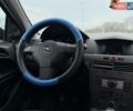 Синий Опель Астра, объемом двигателя 1.4 л и пробегом 220 тыс. км за 3499 $, фото 24 на Automoto.ua