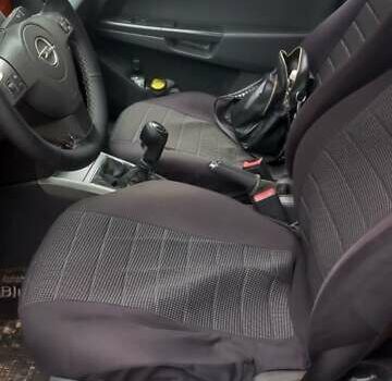 Синий Опель Астра, объемом двигателя 1.36 л и пробегом 254 тыс. км за 4000 $, фото 16 на Automoto.ua