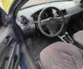 Синий Опель Астра, объемом двигателя 1.4 л и пробегом 345 тыс. км за 2800 $, фото 15 на Automoto.ua
