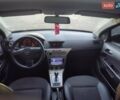 Синий Опель Астра, объемом двигателя 1.4 л и пробегом 254 тыс. км за 4700 $, фото 24 на Automoto.ua