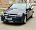 Синий Опель Астра, объемом двигателя 1.6 л и пробегом 240 тыс. км за 5999 $, фото 1 на Automoto.ua