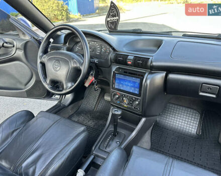 Синий Опель Астра, объемом двигателя 1.6 л и пробегом 229 тыс. км за 3999 $, фото 24 на Automoto.ua