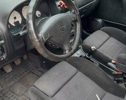 Синий Опель Астра, объемом двигателя 1.6 л и пробегом 375 тыс. км за 2100 $, фото 4 на Automoto.ua