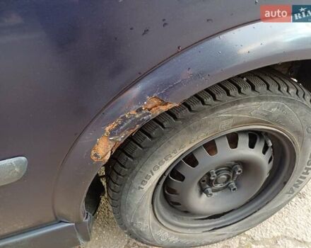 Синий Опель Астра, объемом двигателя 1.7 л и пробегом 310 тыс. км за 2300 $, фото 22 на Automoto.ua