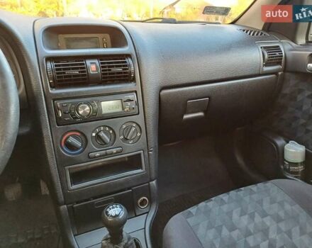 Синий Опель Астра, объемом двигателя 1.7 л и пробегом 310 тыс. км за 2300 $, фото 15 на Automoto.ua