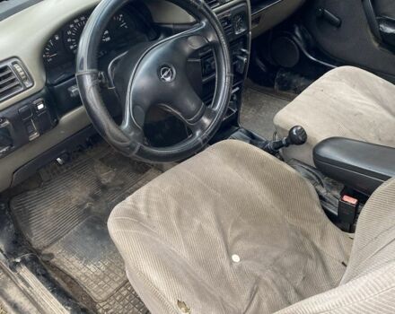 Синий Опель Астра, объемом двигателя 1.6 л и пробегом 283 тыс. км за 800 $, фото 5 на Automoto.ua