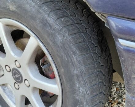 Синий Опель Астра, объемом двигателя 1.6 л и пробегом 324 тыс. км за 1800 $, фото 10 на Automoto.ua