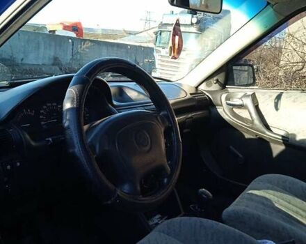 Синий Опель Астра, объемом двигателя 1.6 л и пробегом 350 тыс. км за 2300 $, фото 7 на Automoto.ua