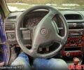 Синий Опель Астра, объемом двигателя 2 л и пробегом 220 тыс. км за 3250 $, фото 5 на Automoto.ua
