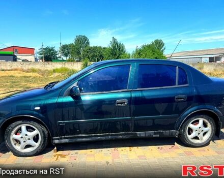 Синий Опель Астра, объемом двигателя 1.4 л и пробегом 102 тыс. км за 2800 $, фото 4 на Automoto.ua