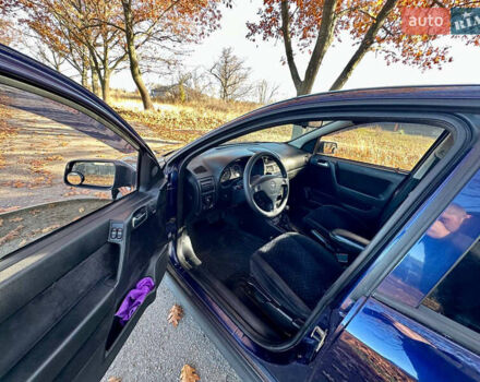 Синій Опель Астра, об'ємом двигуна 1.8 л та пробігом 220 тис. км за 3600 $, фото 18 на Automoto.ua